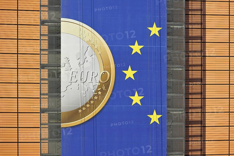 Banner about the euro hanging from the Berlaymont building of the European Commission, executive body of the European Union, Brussels, Belgium, Europe