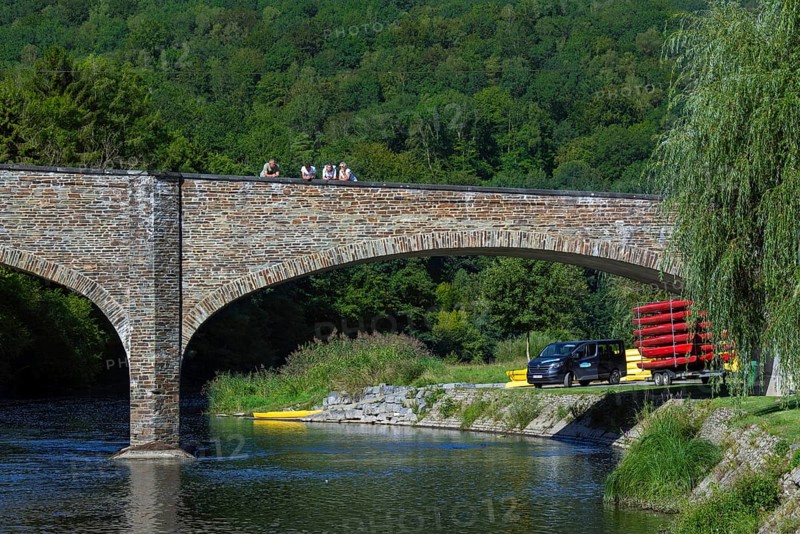 Bridge with tourists looking over the Semois river in summer at the village Vresse-sur-Semois, province of Namur, Belgian Ardennes, Wallonia, Belgium, Europe