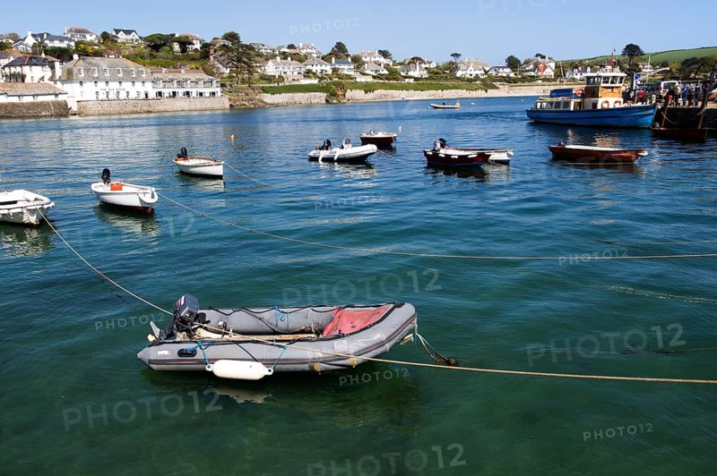 Ferry boat and dinghies in the harbour, St Mawes, Cornwall, England, UK