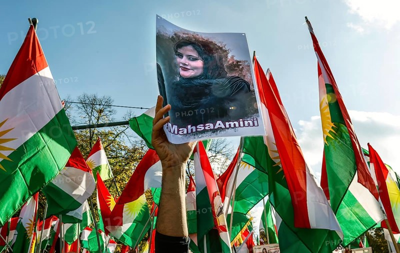 A picture of Mahsa Amini is shown at a demonstration in Berlin. Thousands of Iranians protest in support of the protests in Iran. The demonstration was called by the Woman Life Freedom Collective, Berlin, 22 October 2022