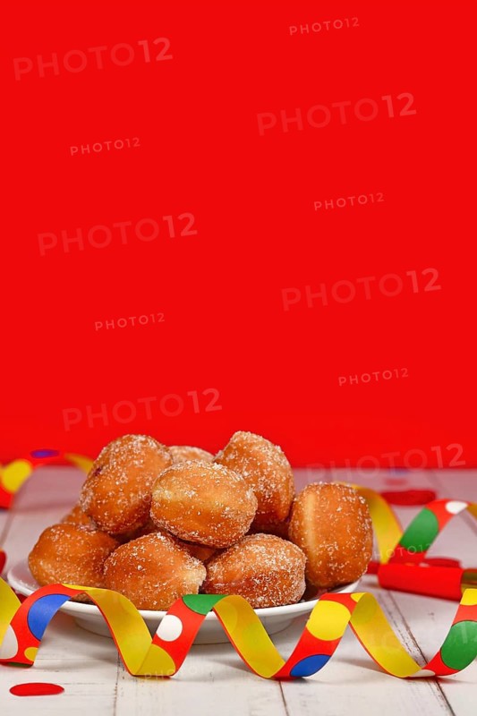 Traditional German 'Berliner Pfannkuchen', a donut without hole filled with jam served during carnival