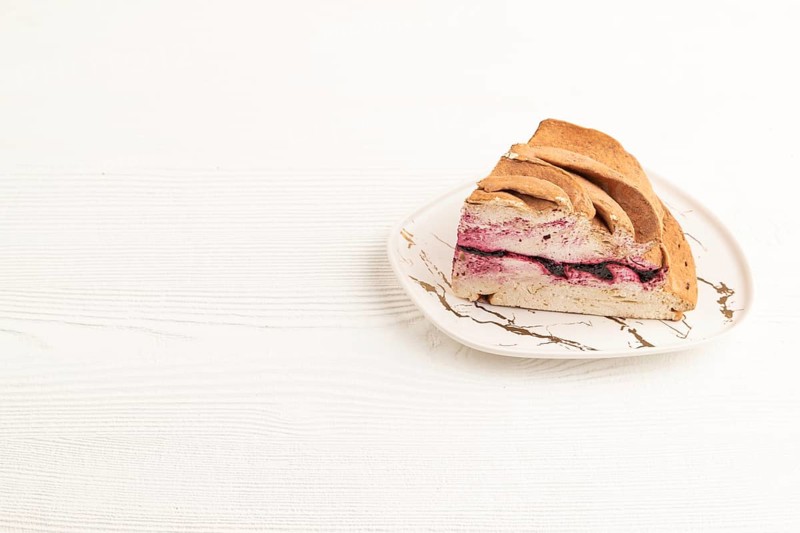 Zephyr or marshmallow cake on white wooden background. side view, copy space