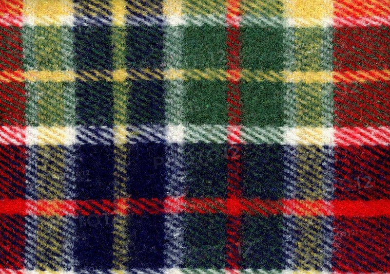 Red green blue and yellow tartan fabric texture background
