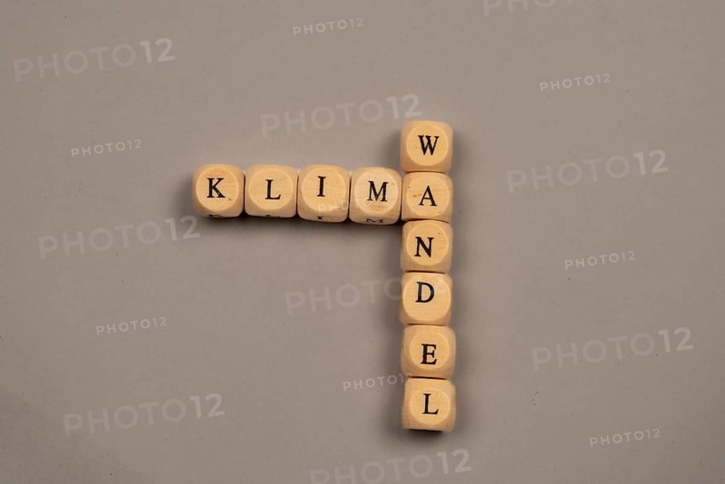 Cubes with letters form the word climate change, light background, top view, studio shot, Germany, Europe