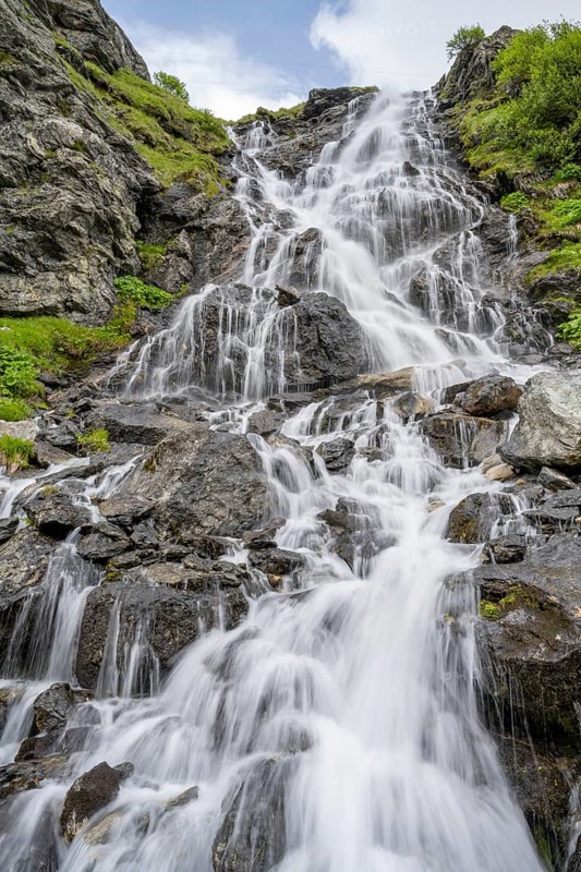 Waterfall on a mountainside, long exposure, Berliner Hoehenweg, Zillertal Alps, Tyrol, Austria, Europe