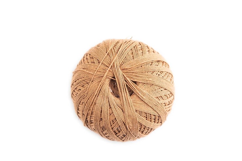 Spool of thread isolated on white background. Top view, flat lay, close up
