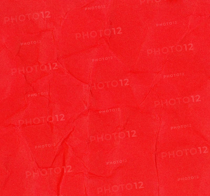 Crumpled red paper texture background