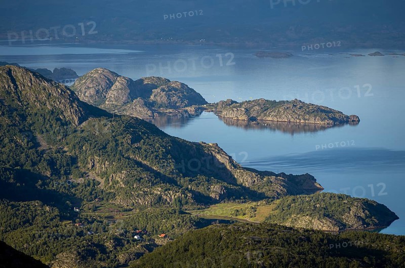 Coast in atmospheric evening light, view from the top of Dronningsvarden or Stortinden, Ulvagsundet, Vesteralen, Norway, Europe