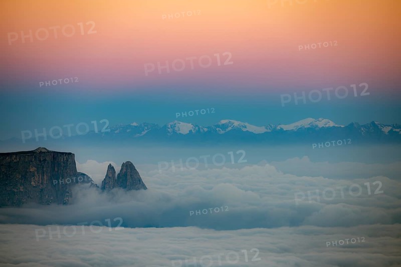 Sea of fog with Dolomite peaks in the background at blue hour, Corvara, Dolomites, Italy, Europe