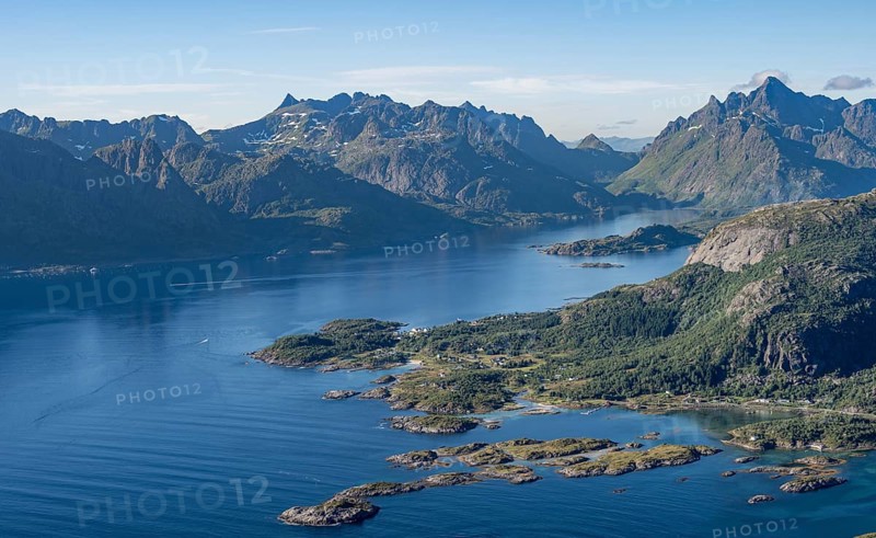 View of coast in Raftsund fjord and mountains in the evening light, view from the top of Dronningsvarden or Stortinden, Vesteralen, Norway, Europe