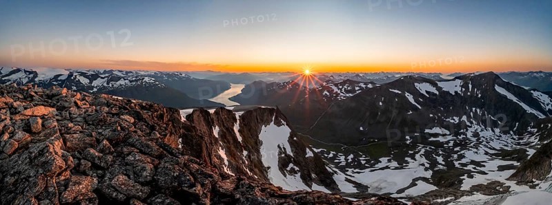 Panorama, view of mountains and fjord Faleidfjorden, sun star at sunset, summit of Skala, Loen, Norway, Europe