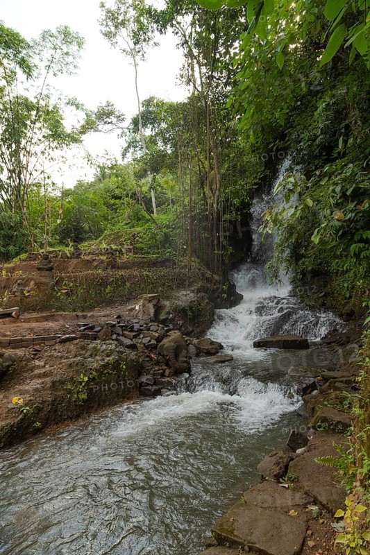 Uma Anyar waterfall, Bali island, Ubud, Indonesia. Jungle, tropical forest, daytime with cloudy sky