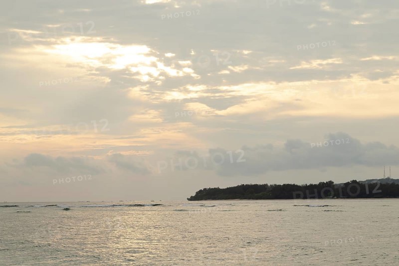 Lombok and Gili Air islands, overcast, cloudy day, sky and sea. Vacation, travel, tropics concept, no people. Sunset, sand beach