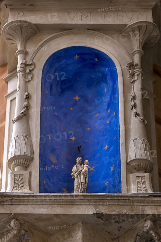 Niche on a corner house with a small statue of a saint, Genoa, Italy, Europe