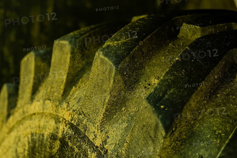 Closeup of tire tread of industrial heavy equipment roadwork machine