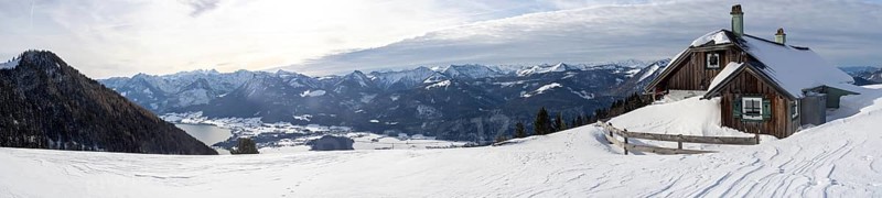 Winter mood, snow-covered landscape, snow-covered alpine peaks, view from the Schafbergalm to Lake Wolfgangsee, panoramic shot, near St. Wolfgang am Wolfgangsee, Salzkammergut, Upper Austria, Austria, Europe