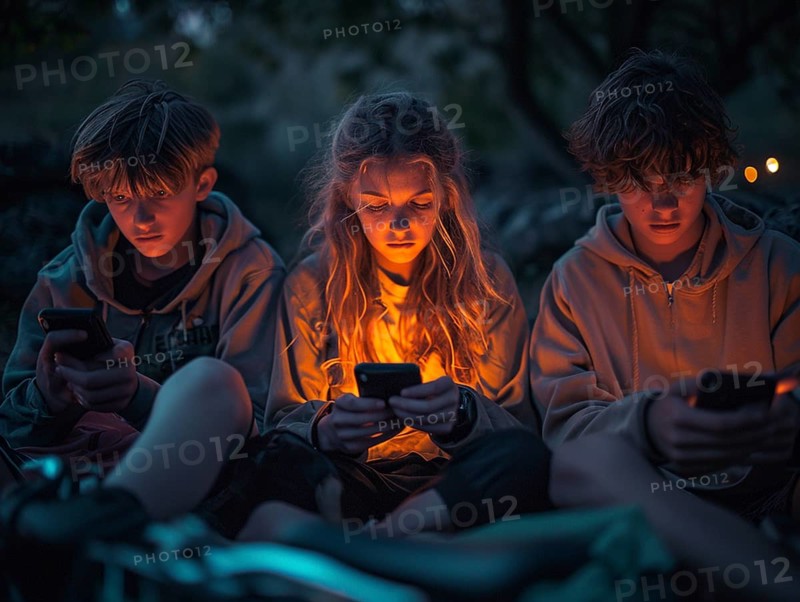 Several young people look bored at their cell phones, neglect social contacts, sport, reading, AI generated