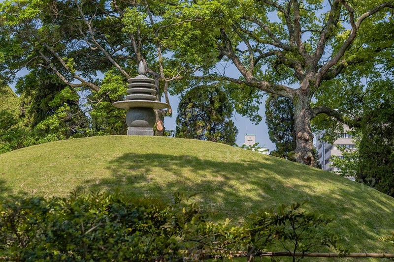 Round stone carved pagoda on hilltop in Hiroshima Peace Park in Hiroshima, Japan, Asia