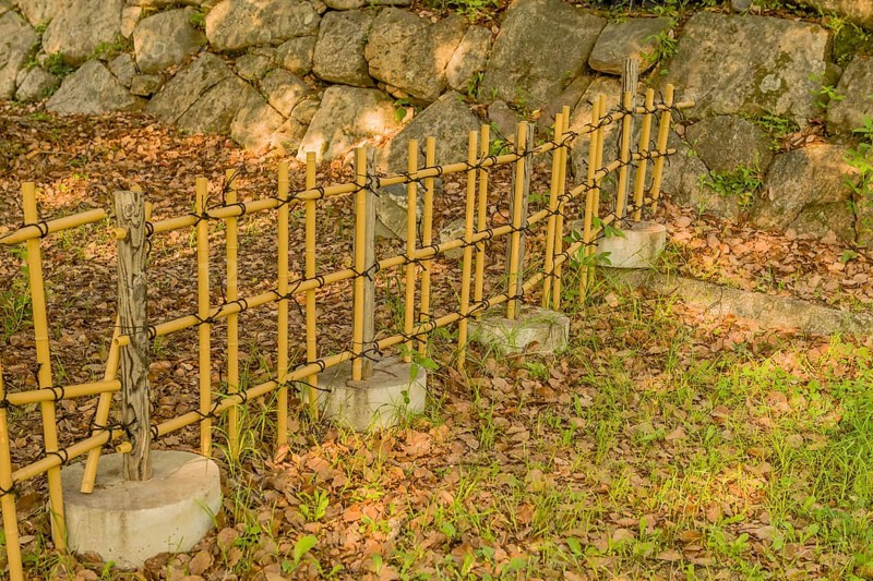 Fence of PVC pipes that resembles bamboo in Hiroshima, Japan, Asia