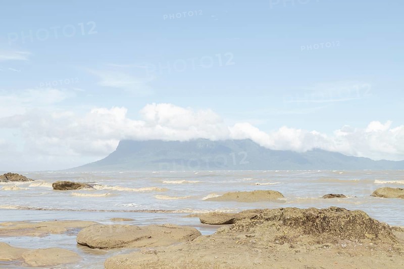 Cliff in Bako national park, sunny day, blue sky and sea. Vacation, travel, tropics concept, no people, Malaysia, Kuching, Asia