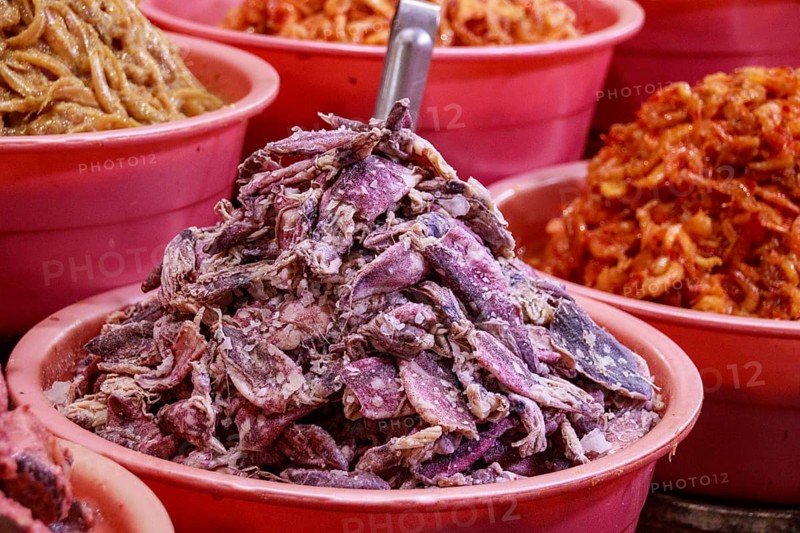 Fermented salted squids and shrimps displayed and sold at the local Samaki Market showing the authentic culture and cuisine in Kampot, Cambodia, Asia