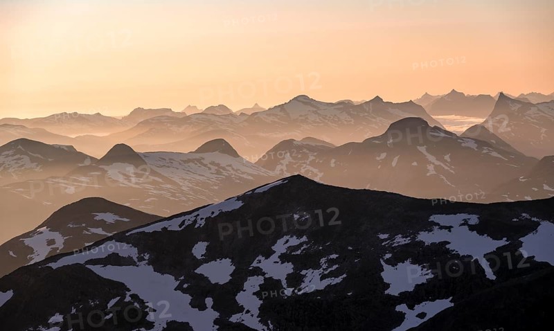 Mountain panorama, mountain peaks in soft light at sunset, view from the summit of Skala, Loen, Norway, Europe