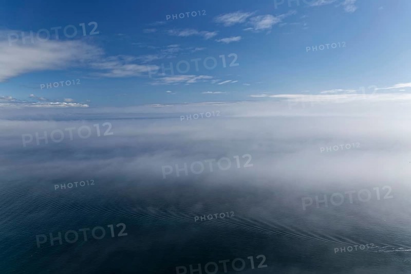 Coastal seascape in fog, Gulf of Saint Lawrence, Province of Quebec, Canada, sea, water, blue, North America