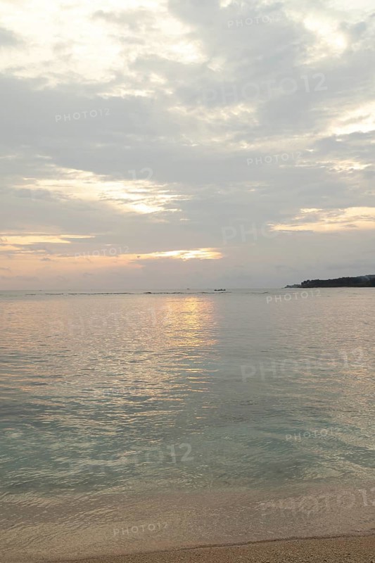 Lombok and Gili Air islands, overcast, cloudy day, sky and sea. Vacation, travel, tropics concept, no people. Sunset, sand beach