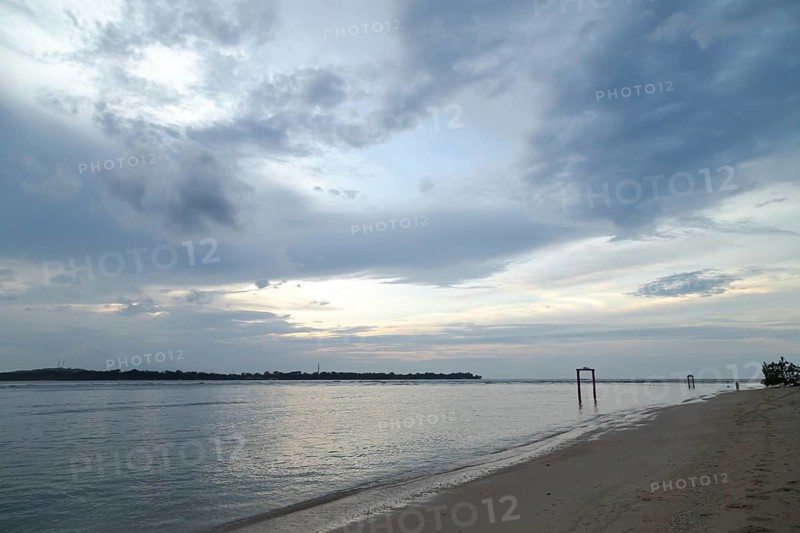 Lombok and Gili Air islands, overcast, cloudy day, sky and sea. Vacation, travel, tropics concept, no people. Sunset, sand beach