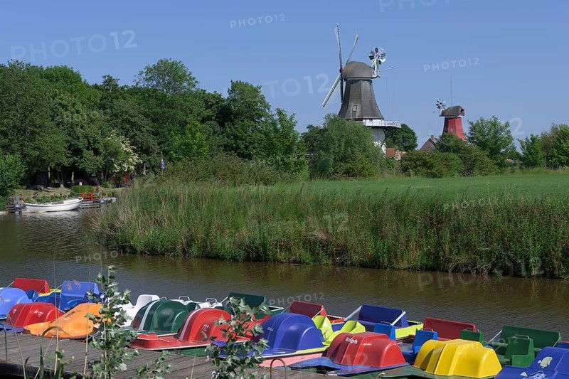Twin mills in Krummhoern-Greetsiel with boat hire, Gruene Muehle, Rote Muehle, Germany, Europe