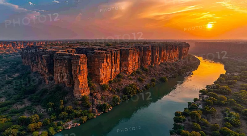 Sunset over Gandikota fort on the banks of the Penner river river with cliffs in Kadapa district, Andhra Pradesh, India during golden hour, AI generated