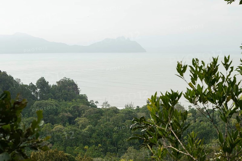 Bako national park, sea sandy beach, overcast, cloudy day, sky and sea. Vacation, travel, tropics concept, no people, Malaysia, Kuching, Asia