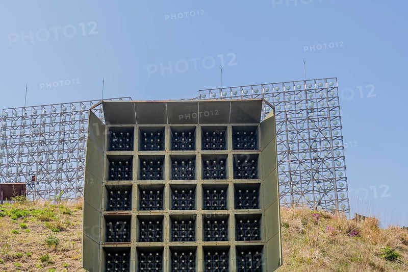Military array of loud speakers and spot lights on hill overlooking DMZ observation area in Goseong, South Korea, Asia