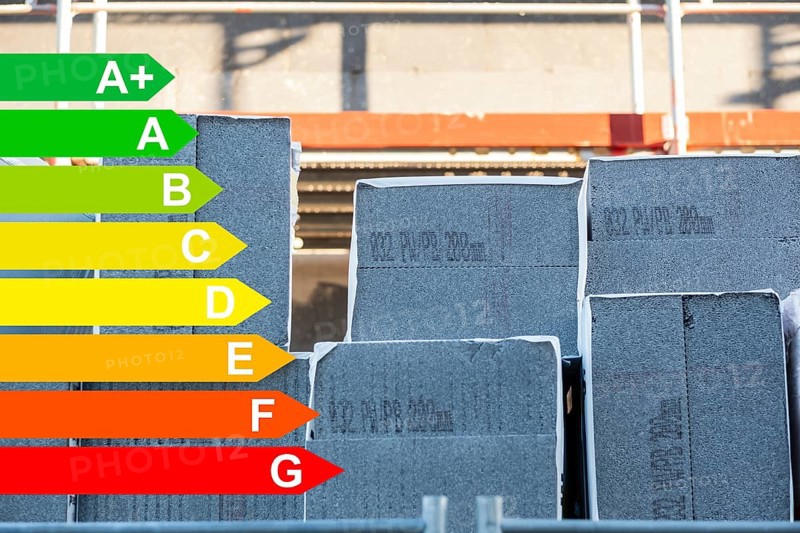 Insulation of a house facade with Polystorol insulation boards, graphic with energy efficiency classes for buildings according to the GEG, Duesseldorf, Germany, energy efficiency, Europe