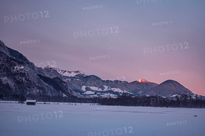 Snowy landscape at sunrise with mountain panorama, Nussdorf, Bavaria, Germany, Europe