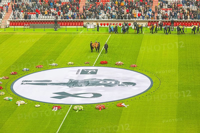 More floral wreaths are brought to the banner, banner with Franz Beckenbauer and floral wreaths, FC Bayern Munich funeral service for Franz Beckenbauer, Allianz Arena, Froettmaning, Munich, Upper Bavaria, Bavaria