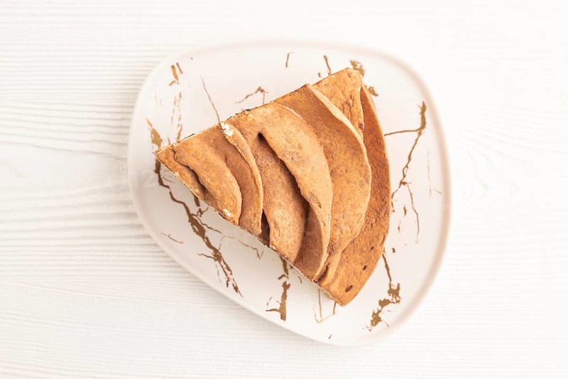 Zephyr or marshmallow cake on white wooden background. top view, flat lay, close up