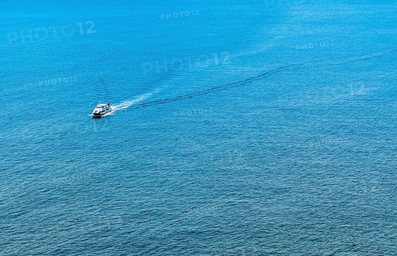 Unidentified ferry crossing open water near Jeju Island in South Korea