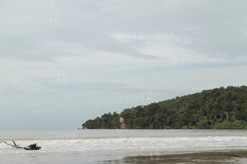 Bako national park, sea sandy beach, overcast, cloudy day, sky and sea. Vacation, travel, tropics concept, no people, Malaysia, Kuching, Asia