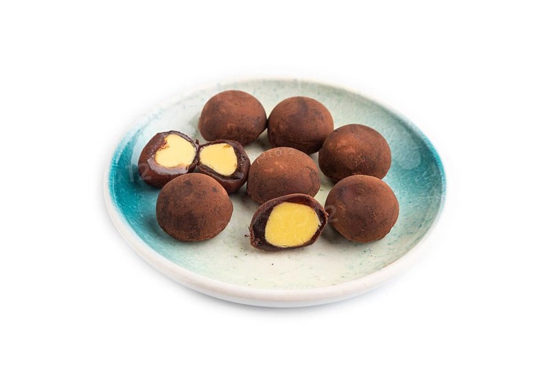 Japanese rice sweet buns chocolate mochi filled with cream isolated on white background. side view, copy space