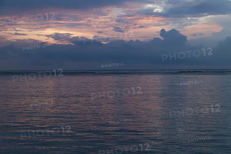 Lombok and Gili Air islands, overcast, cloudy day, sky and sea. Vacation, travel, tropics concept, no people. Sunset, sand beach