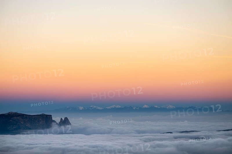 Sea of fog with Dolomite peaks in the background at blue hour, Corvara, Dolomites, Italy, Europe