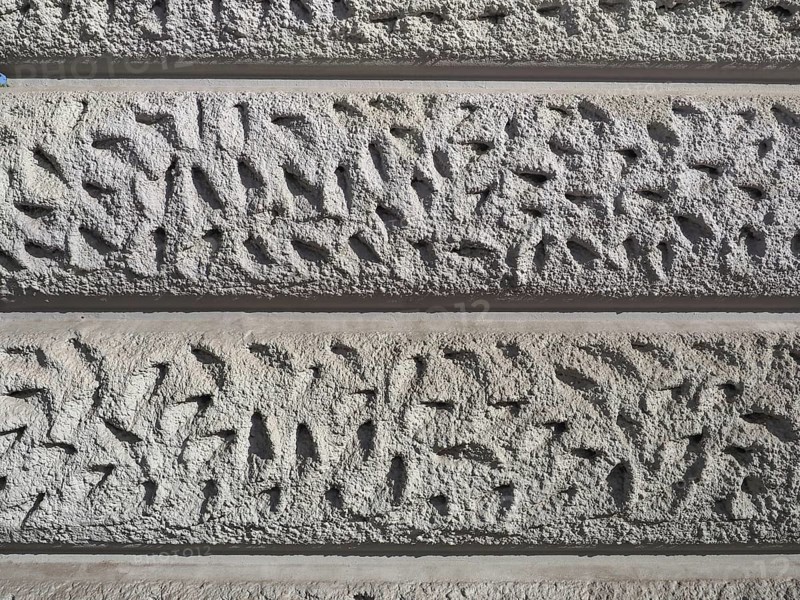 Grey ashlar plaster wall background