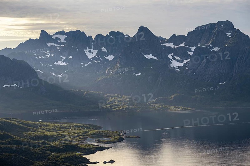 Fjord Raftsund and mountains in atmospheric evening light, view from the summit of Dronningsvarden or Stortinden, Vesteralen, Norway, Europe