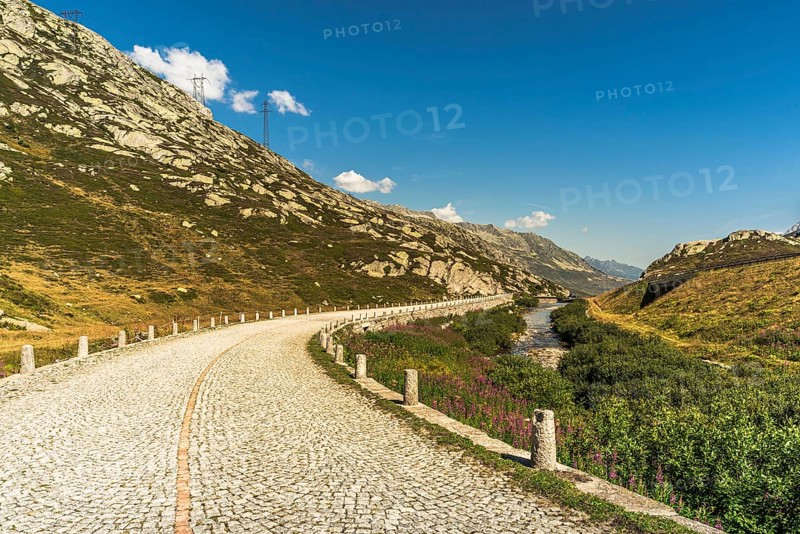 Gotthard Pass, mountain landscape and old pass road with cobblestones, Canton Ticino, Switzerland, Europe