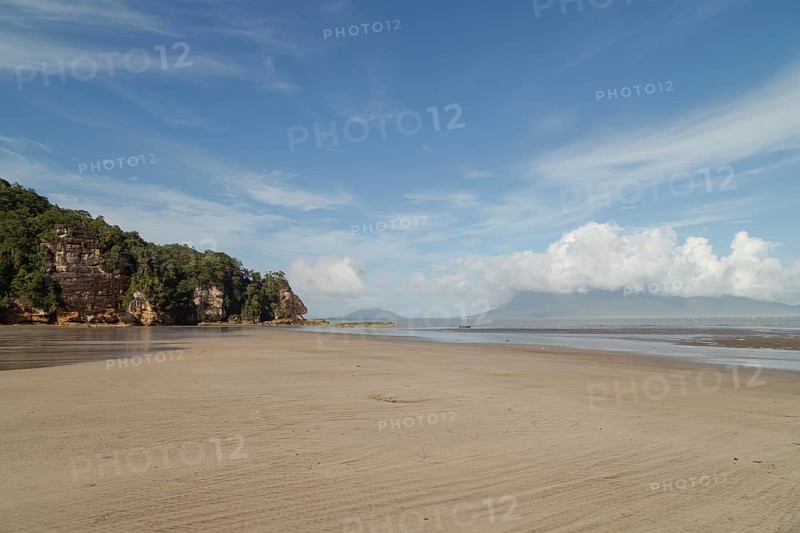 Cliff in Bako national park, sunny day, blue sky and sea. Vacation, travel, tropics concept, no people, Malaysia, Kuching, Asia