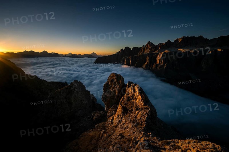 Sunrise over a sea of fog and Dolomite peaks in the background, Corvara, Dolomites, Italy, Europe
