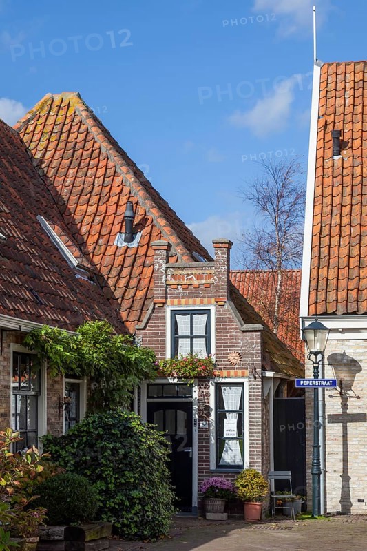 Fishing village Oosterend with the smallest house of Oosterend, North Sea island Texel, North Holland, Netherlands