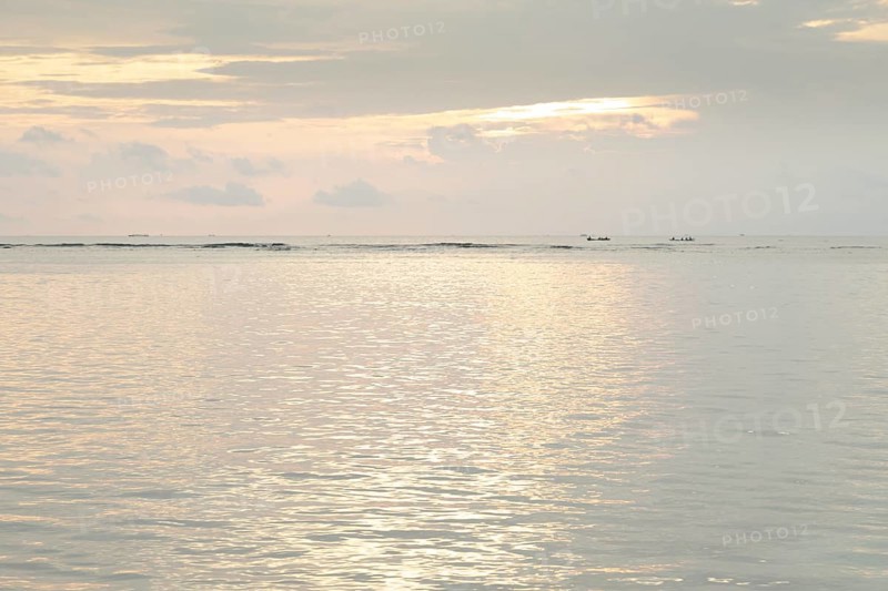 Lombok and Gili Air islands, overcast, cloudy day, sky and sea. Vacation, travel, tropics concept, no people. Sunset, sand beach