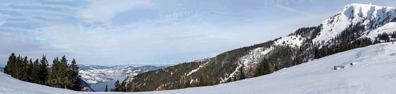 Winter mood, snowy landscape, view from the Schafbergalm to the Mondsee and the Schafberg, panoramic shot, near St. Wolfgang am Wolfgangsee, Salzkammergut, Upper Austria, Austria, Europe